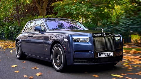 A ROLLS Royce Phantom, like the one recently auctioned off by the Bureau of Customs and purchased by Purefoods Corporation, cruises down the road.