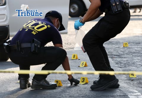 (April 28 2026) Scene of the Crime Operative SOCO gather evidence following an alleged ambush of two unidentified persons  injured by a tandem at the corner of Timog Avenue and EDSA in Quezon City on Tuesday, April 28, 2026. Photo/Analy Labor
