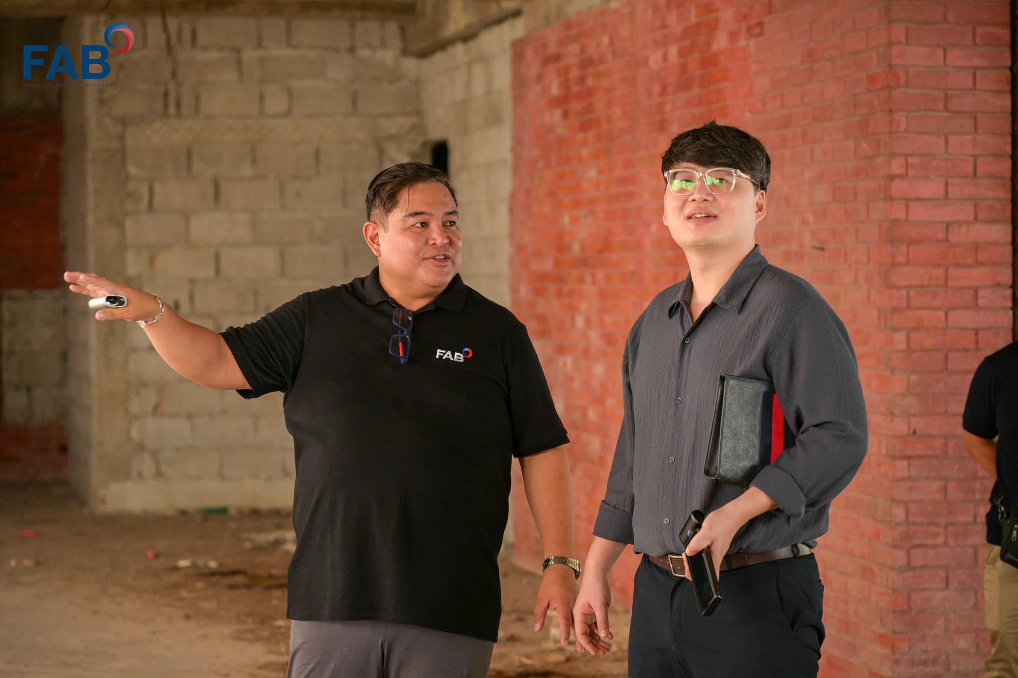 Authority of the Freeport Area of Bataan (AFAB) Administrator and CEO Hussein P. Pangandaman talks with an official from Finora Global during their visit to the Freeport Area of Bataan on April 2026.