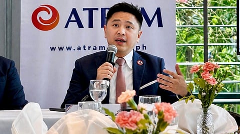 MIGUEL Liboro, head of Products at ATRAM Trust Corporation, speaks during the launch of the ATRAM Nasdaq Equity Income Feeder Fund at Chef Jessie Rockwell Club on 28 April, outlining the strategy to generate monthly income from global technology stocks.