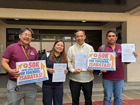 ACT Teachers Partylist Rep. Antonio Tinio together with members of the Alliance of Concerned Teachers during the filing of House Bill 8965 which seeks to raise the minimum salary for teachers in public and private institutions to P50,000 at the House of Representatives this Tuesday.