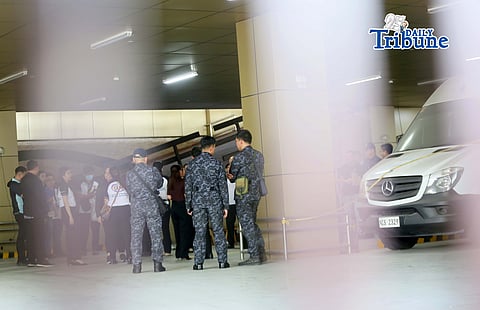 (April 29 2026) Customs Assistant Commissioner Vincent Philip Maronilla and Bureau of Internal Revenue (BIR) Assistant Commissioner Enforcement and Advocacy Service James Roldan and other officials speak to the media at the St. Gerrard Construction office in Pasig City on Wednesday as they conduct the release from Customs custody and implementation of administrative measures to secure vehicles of the Discaya couple in ongoing tax cases, during the service of the notice, they did not allowing the media to enter inside the premises, as requested by Discaya’s legal counsel. Photo/Analy Labor