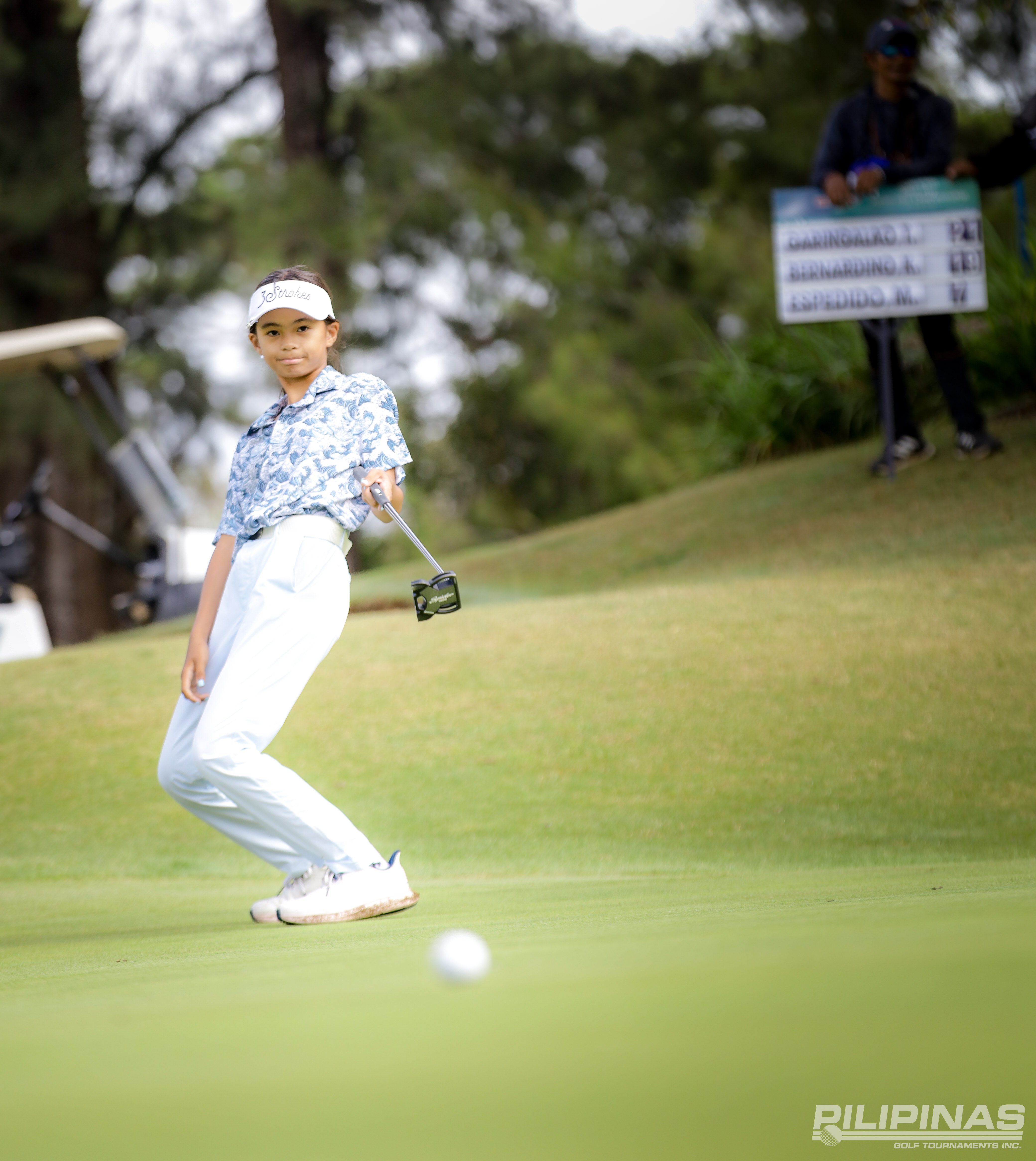 Mavis Espedido celebrates her wire-to-wire win in the girls’ 11-14 division of the ICTSI John Hay Junior PGT Championship on Wednesday.