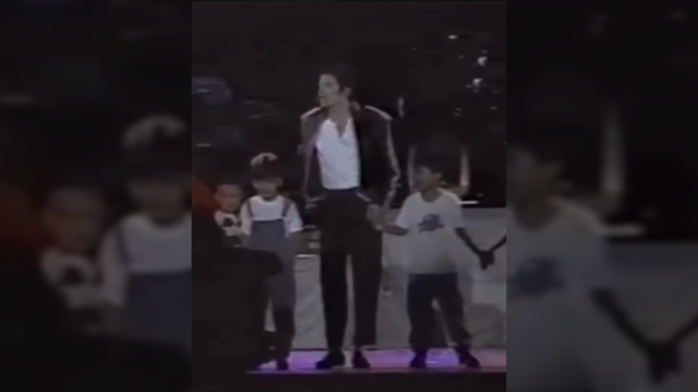 IC Mendoza (kid in white) with Michael Jackson on stage. 
