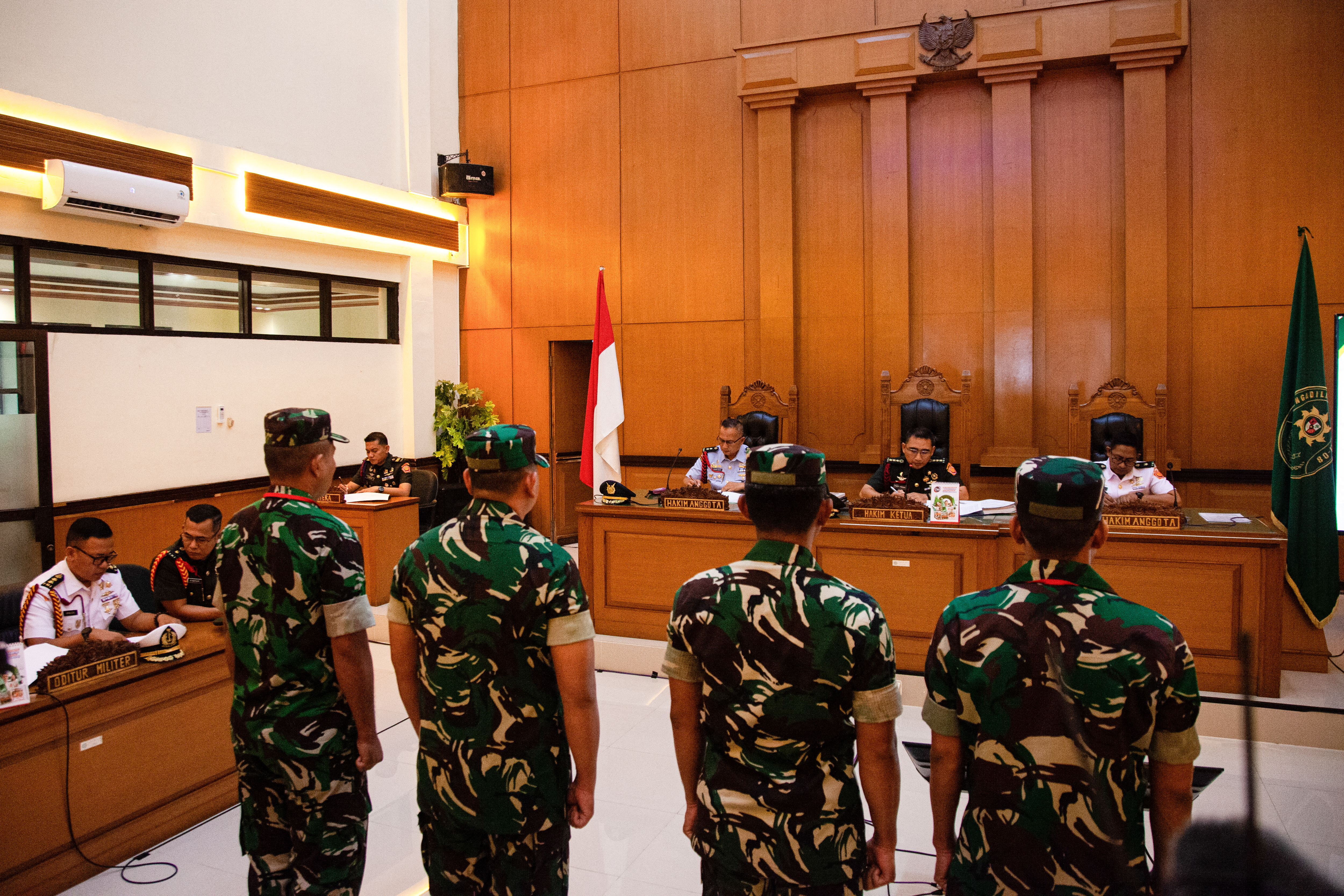 MILITARY personnel accused of throwing acid at human rights activist Andri Yunus attend a trial at a military court in Jakarta on 29 April 2026.