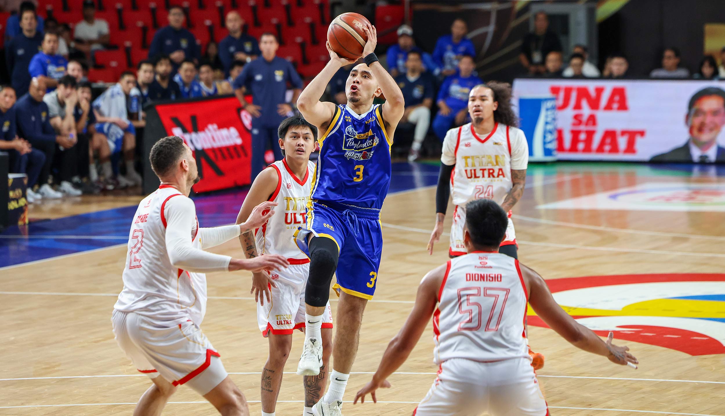 PAUL Lee of Magnolia shoots over four Titan Ultra defenders during their PBA Commissioner’s Cup game last Wednesday at the Ninoy Aquino Stadium. The Hotshots prevailed, 135-98.