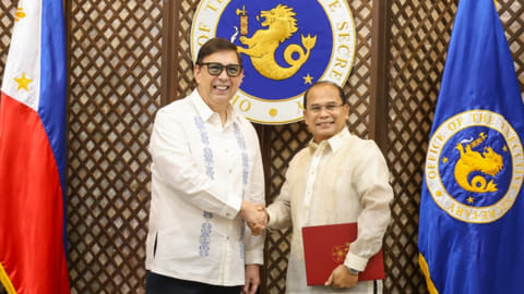 BCDA chairperson Atty. Jerry R. Marasigan (right) and Secretary of Finance Ralph Recto at Malacañang Palace on Wednesday, 29 April 2026, shake hands after the latter officially swore in Marasigan as the new Bases Conversion Development Authority chairman, replacing Atty. Hilario B. Paredes.