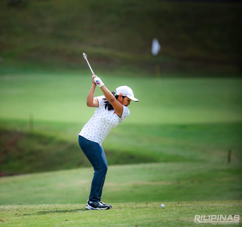 MONA Sarines displays her solid form en route to posting an 11-shot win over twin sister Liza in the girls 15-18 division of the ICTSI John Hay Junior PGT Championship on Thursday. 