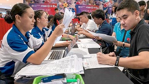 JOBSEEKERS take advantage of the opportunity to land work as Labor Day job fairs launched simultaneously nationwide.