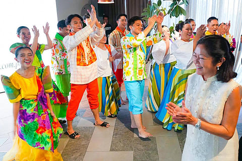 FIRST Lady Liza Araneta-Marcos (right) joins performers at the Center for Culinary Arts Manila in a moment that blends statecraft with soulcraft, where Filipino flavors become a language for culture, memory and pride.
