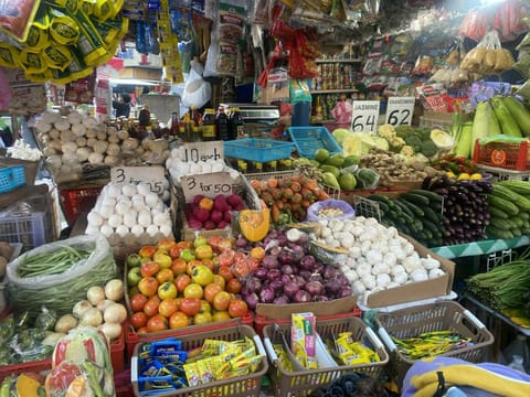 Supermarket vendors at Bustillos spent Labor Day working instead of resting, saying the rising cost of living leaves them no choice but to keep earning, while some workers marked the holiday with modest family gatherings adjusted to higher prices.