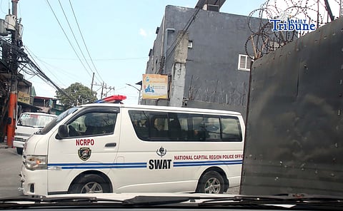 (May 2, 2026) National Capital Region Police Office (NCRPO) and SWAT vehicles were seen exiting the gate of Pyro Gas along Santa Quiteria Road in Caloocan City after a raid on alleged illegal rebranding and refilling of LPG tanks. Seventeen persons were arrested, according to reports. Photo by Analy Labor
