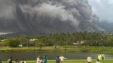 MAYON Volcano steals the show from residents in the midst of an event in Camalig, Albay, as thick gray smoke billowed into the sky,reducing visibility for some tourists in the area. Authorities continue to assess the extent of the eruption and potential for further activity.