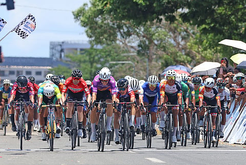 Ivan Anisimov of LCW UAE (center) scores back-to-back wins after topping Stage 5 of the MPTC Tour of Luzon 2026 on Sunday in Tuguegarao, Cagayan.