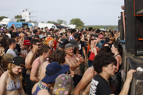 REVELERS dance during a free-party at a military site in Cornusse, near Bourges, central France on 2 May 2026.