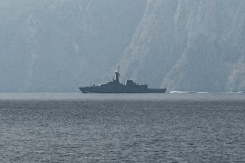 A navy vessel is seen sailing in the Strait of Hormuz, a vital waterway through which much of the world's oil and gas passes on March 1, 2026.
Two ships were attacked in the Strait of Hormuz on March 1, maritime security agencies said, as Iran pressed a second day of strikes in response to US-Israeli military strikes on Iran killing it's supreme leader.
