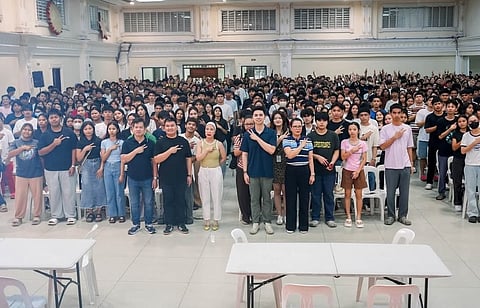 City officials led by Mayor Vilma Balle-Caluag (center) pose with the student beneficiaries during the distribution of the second batch of the “K-Abe” Educational Assistance Program at Heroes Hall.