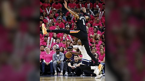 ANTHONY Edwards of the Minnesota Timberwolves evades the defense of Victor Wembanyama of the San Antonio Spurs during their NBA Western Conference playoffs on Monday. The Wolves prevailed, 104-102.