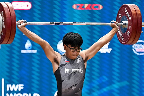 ALBERT delos Santos swears the death of his father recently played a big role in his success in the IWF Junior World Championships in Egypt.