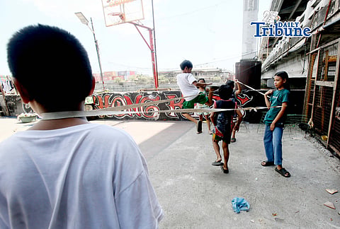  (May 06 2026) A group of children spend their time playing Chinese Garter, a popular traditional Filipino outdoor game, during their school vacation, in Caloocan City on Wednesday May 6 2026. Photo/Analy Labor
