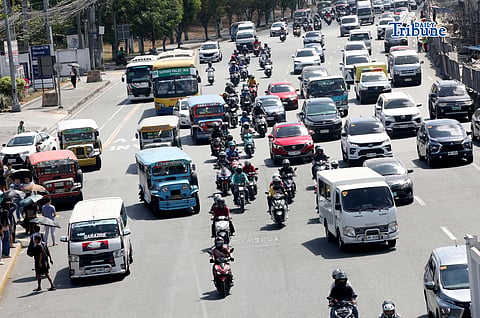(May 08 2026) Motorcycle plying along Commonwealth Avenue in Quezon City on Friday May 8 2026. The Department of Social Welfare and Development has ordered transport network companies to submit all the names of drivers onboarded in their system. This is related to discrepancies in the list of TNVS drivers and motorcycle taxi riders who are beneficiaries of the fuel subsidy. DSWD Spokesperson Asec. Irene Dumlao assured that the list of drivers who will receive cash relief assistance from the department is clean. But the list of drivers who will be given assistance under the AICS will still come from the LTFRB. Photo/Analy Labor