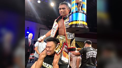 DIANXING Zhu of China scores a big win through relentless pressure and incredible stamina.