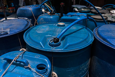 People buy drinking water at a refilling station in Baseco, Manila, on Tuesday, 12 May 2026, as water concessionaires Manila Water Company Inc. and Maynilad Water Services Inc. announce service interruptions this week in parts of Metro Manila, Rizal and Cavite due to maintenance work and increased demand amid extreme heat.
