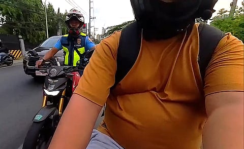 Screenshot from the video uploaded on Facebook by motorcycle rider, Vincent Cayanes. 