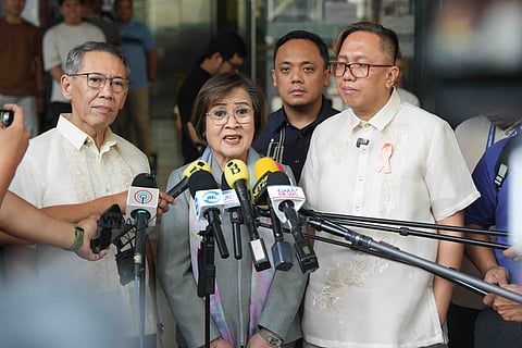 Mamamayang Liberal Rep. Leila de Lima (middle) with Akbayan Reps. Chel Diokno (left) and Perci Cendana (right) at the Quezon City Prosecutor's Office this Friday
