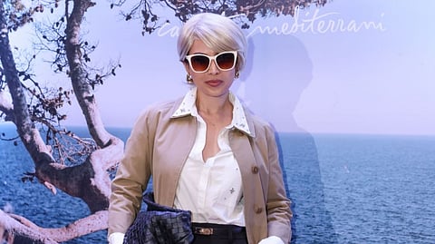 A GPhotograph courtesy of Enchanted Kingdom
UEST poses in a fashion-forward ensemble during the exclusive screening of The Devil Wears Prada 2 hosted by Toni Pons.