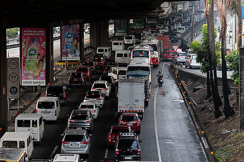Motorists experience heavy traffic on the South Luzon Expressway southbound in Parañaque City on Saturday morning, following heavy rain that caused flooding in some parts of the expressway.
