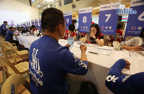 (May 16 2026)  Qualified driver-partners of JoyRide Philippines (MotoTaxi, Car, and Delivery) who were unable to receive their payouts during the initial wave of distribution. Queue to receive their P5000 AICS on Saturday May 16, 2026, at UP Bahay ng Alumni in Quezon City. The activity was organized by JoyRide Philippines as part of its continued coordination with the Department of Social Welfare and Development (DSWD) to facilitate the release of AICS assistance. Photo/Analy Labor
