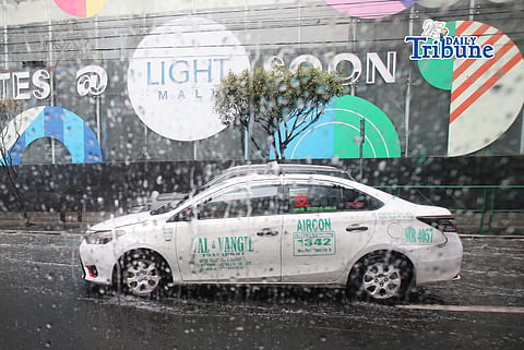 (May 16, 2026) A sudden heavy downpour brings a few floods along EDSA in Mandaluyong City on Saturday, May 16, 2026. Photo by Analy Labor