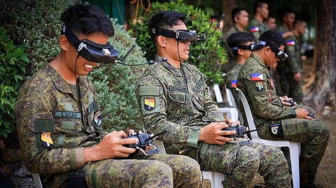 NO, they’re not searching for Sen. Ronald ‘Bato’ dela Rosa. They’re members of the Philippine Army’s drone units, sharpening their skills in a
friendly competition.