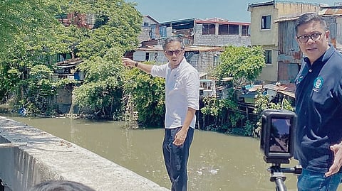 DEPARTMENT of Public Works and Highways Secretary Vince Dizon (left) inspects flood-prone areas in Parañaque City on Monday as concerns continue to rise especially during the rainy season.