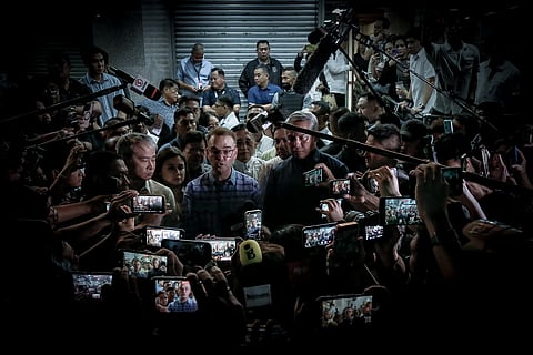 Senate President Alan Cayetano (middle) faced members of the press, shortly after the 13 May shooting inside the premises.