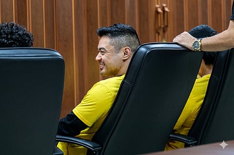 PEANUT Gallery Media Network founder Franco Mabanta smiles alongside his co-accused after being taken into custody following an entrapment operation. Authorities arrested Mabanta and four associates for alleged extortion after he reportedly demanded P300 million from former House Speaker Martin Romualdez to withhold a planned exposé.