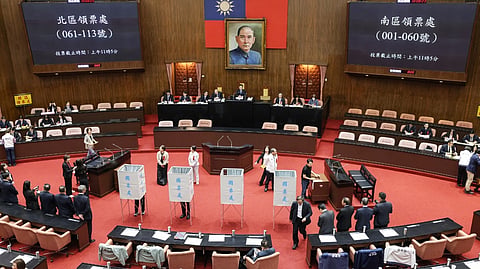 MEMBERS of Taiwan’s opposition parties ‘KMT’ and ‘Taiwan People’s Party’ vote on an impeachment motion against President Lai Ching-te at Legislative Yuan chamber in Taipei.