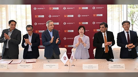 AIIB and ICTSI officials applaud after signing the loan agreement. They are (from left) Manuel V. Pascua, ICTSI chief financial officer and chief risk officer; Christian R. Gonzalez, ICTSI executive vice president; Enrique K. Razon Jr., ICTSI chairman and president; Zou Jiayi, AIIB chair and president; Najeeb Haider, AIIB global director general, project and corporate finance clients; and Yong Zhou, AIIB chief officer, office of the president.