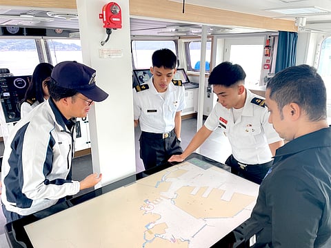CADETS from MMMA use electronic navigational charts onboard the Oshima College’s training vessel Oshima-maru.