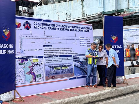 President Ferdinand Marcos Jr. and DPWH Secretary Vince Dizon check the plan for the G. Araneta Drainage Improvement Project in Quezon City as part of the government’s intensified flood mitigation efforts under the “Oplan Kontra Baha” program.