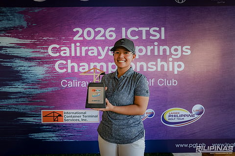 HARMIE Constantino raises the trophy after closing with a 68 for a six-stroke victory in the ICTSI Caliraya Springs Championship in Cavinti, Laguna on Thursday. 