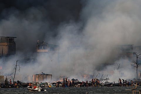 A massive fire engulfs a coastal community at the Parola Compound in Delpan, Manila on the afternoon of 23 May 2026. The blaze broke out around 3:00 PM and quickly escalated, reaching Task Force Charlie by 5:20 PM.