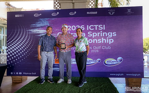ANGELO Que (center) celebrates with ICTSI PR Communication Services and Production Head Bambi Marfil (right) and Caliraya Springs golf director Gary Viajante after winning the ICTSI Caliraya Springs Championship in Cavinti, Laguna on Friday.
