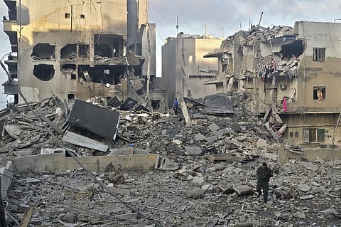 PEOPLE inspect the site of an Israeli strike in the southern Lebanese coastal city of Tyre on 23 May 2026, after two buildings were hit overnight following an Israeli evacuation warning.