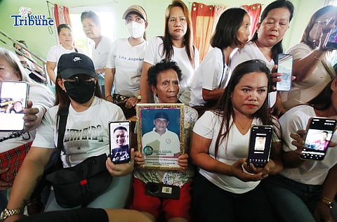 (May 25 2026) Relatives of the missing “sabungeros”  shows a photo of their relatives and speak at the press conference held at Hagonoy Bulacan on Monday May 25 2026, to denied the allegation that they had abandoned the case, they said that they were not required to attend the hearing unless they were specifically called upon. They also cited the financial burden of transportation costs, noting that complainants from Bulacan would have to travel to Laguna for the hearing. Photo/Analy Labor
