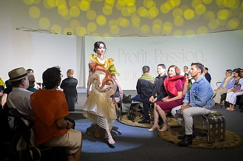 A fashion show was featured during the book signing event.