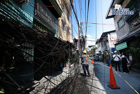 (May 26 2026)  Meralco Lineman removed the unauthorized wire from utility poles, as they conducted an inspection and clearing operations along Mangga Ave. cor. Atis St., Brgy. Kalawaan, Pasig City, on Tuesday May 26 2026. As part of the commitment to public safety, during this Electrical Safety Month. Photo/Analy Labor