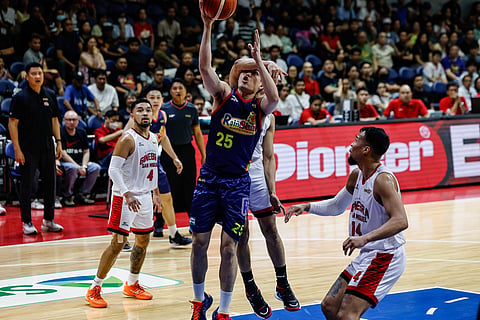 SANTI Santillan of Rain or Shine gets fouled by a Barangay Ginebra defender during Game 4 of their PBA Season 50 Commissioner’s Cup best-of-seven semifinal series on Wednesday.