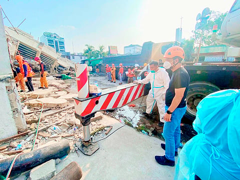 OFFICIALS from the local government of Angeles City visit the site of the building collapse Thursday after rescue teams recovered the fifth casualty from the rubble at 7:57 a.m. The male victim was transported by the City Health Office for disaster victim identification procedures, while a recovered cellphone believed to belong to him was turned over to crime scene operatives.